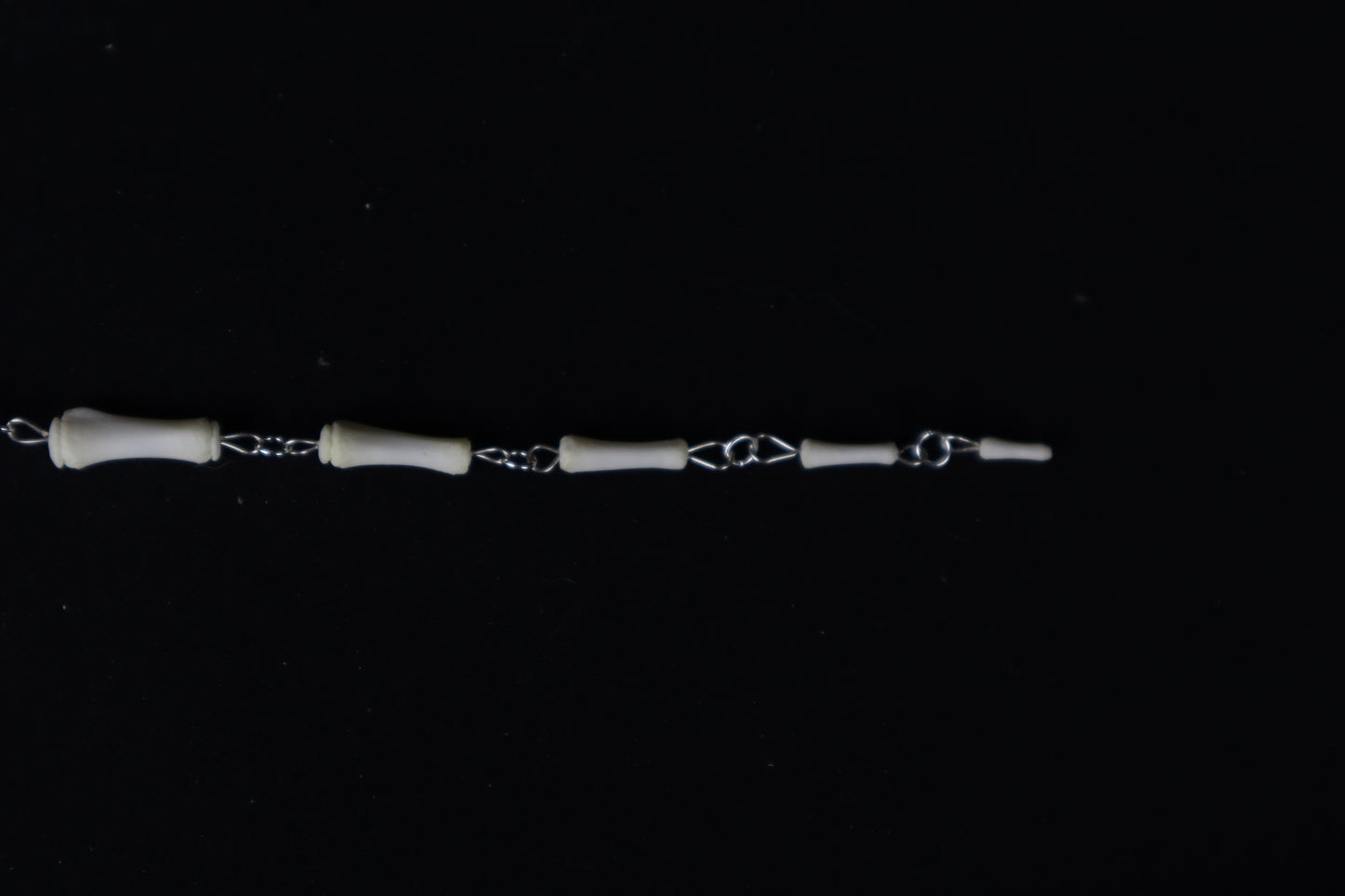 Fluid Whitetail Deer Tail Articulation with Ouroboros Ring