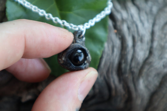 Raccoon Eyeball Talisman