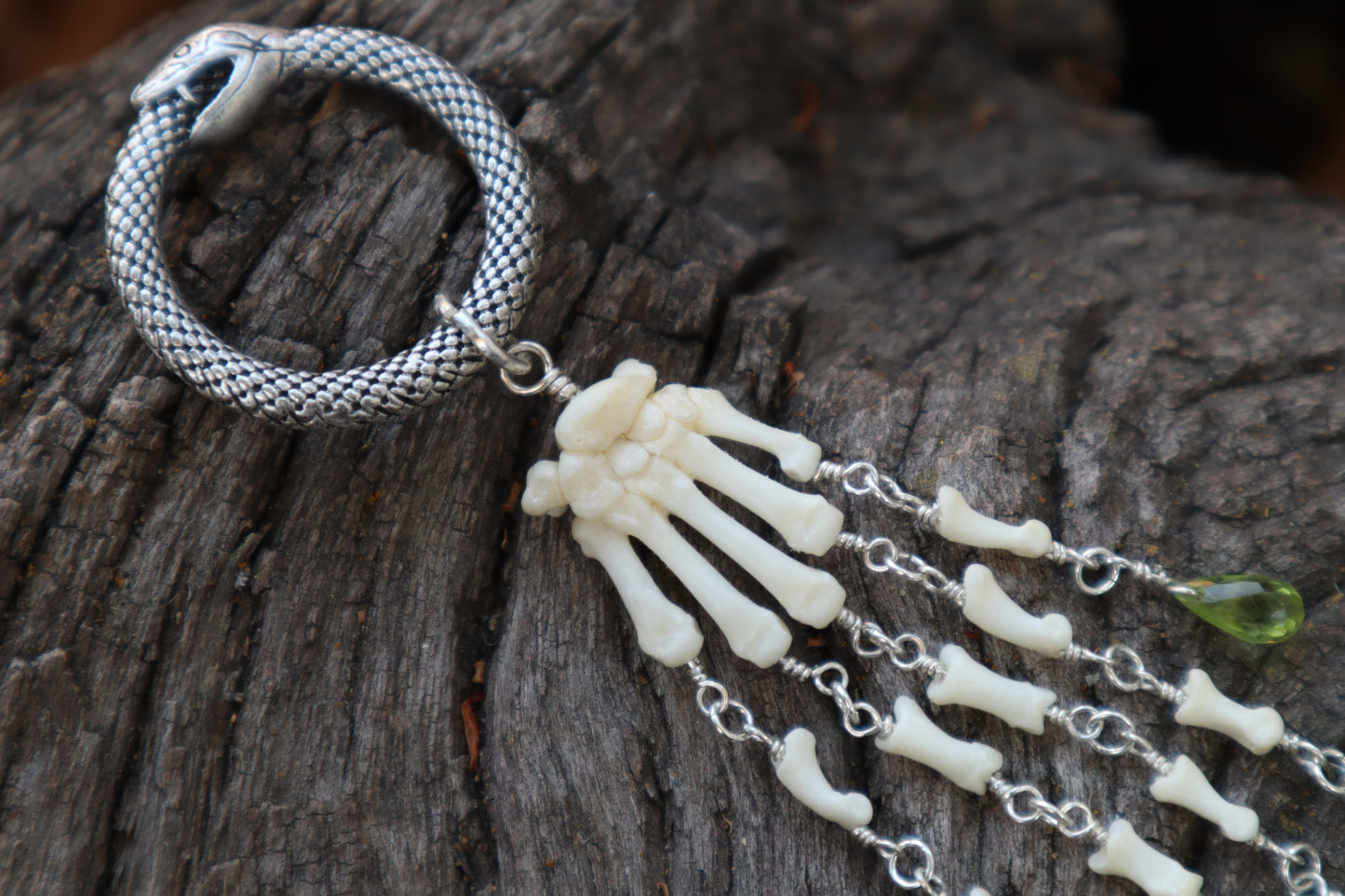 Fluid Striped Skunk Paw Articulation with Peridot “Claws”