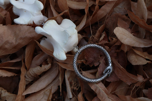 Fluid Scottish Highland Steer Tail Articulation with Ouroboros Ring