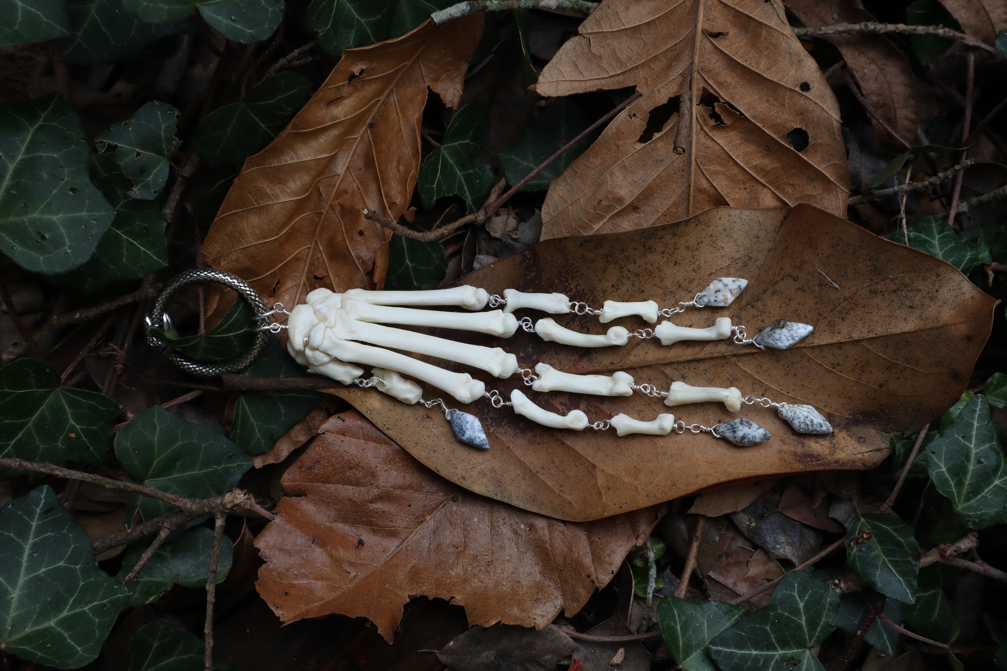 Fluid Bobcat Paw Articulation with Dendritic Opal “Claws”