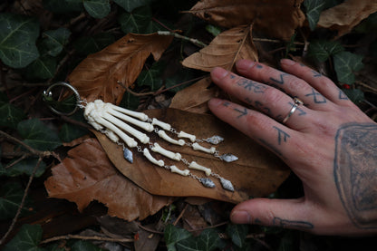 Fluid Bobcat Paw Articulation with Dendritic Opal “Claws”