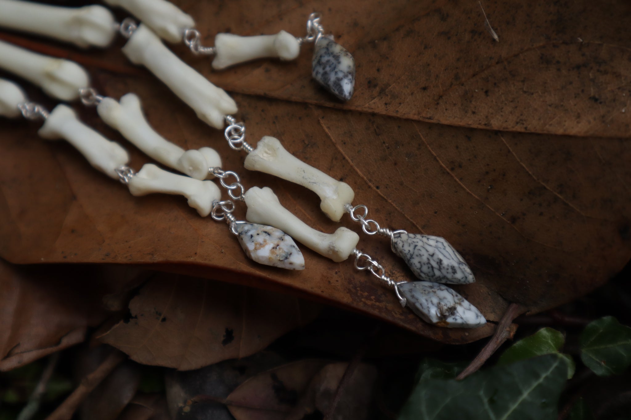 Fluid Bobcat Paw Articulation with Dendritic Opal “Claws”