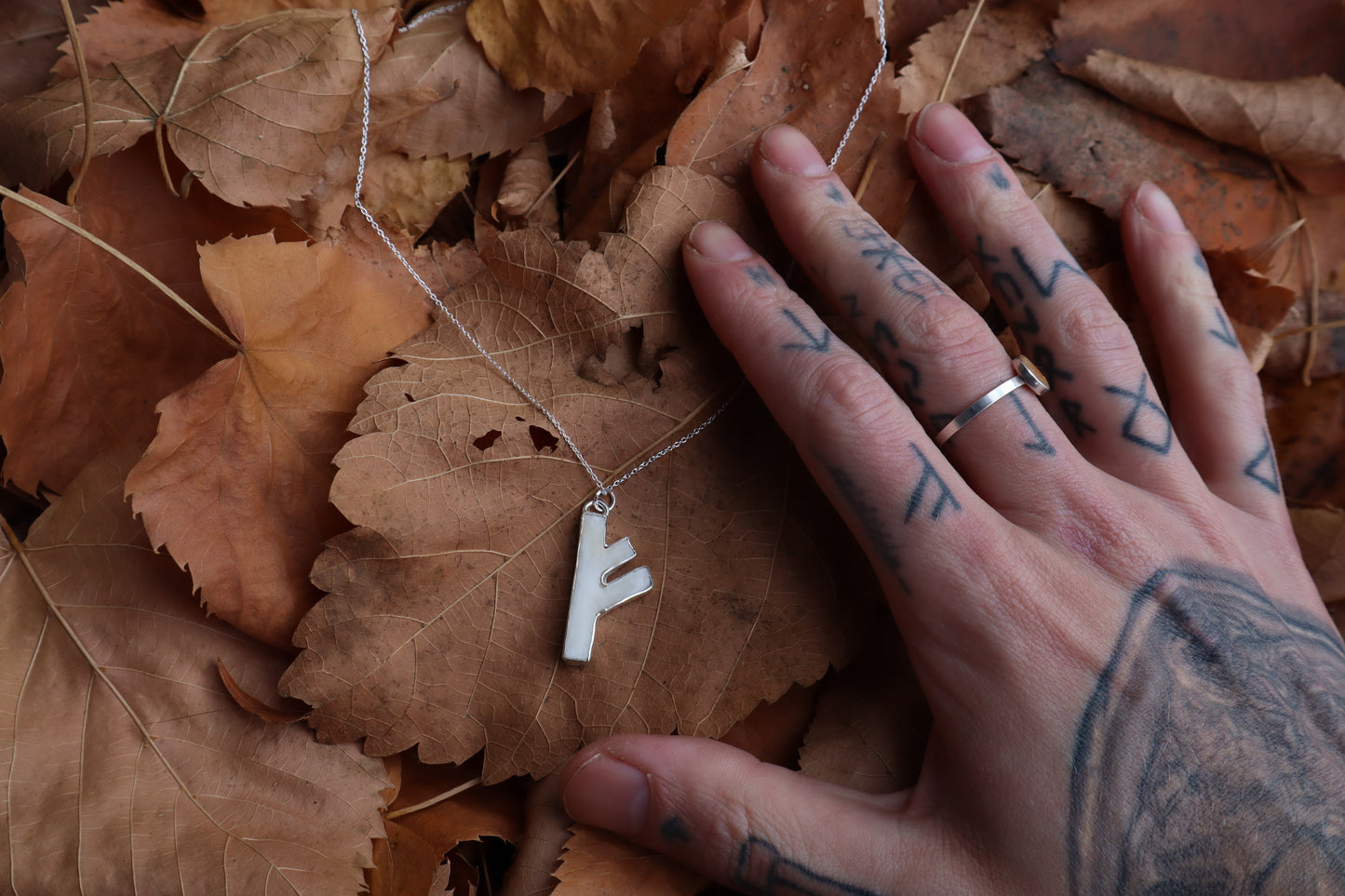 Fehu Wolf Bone and Silver Talisman