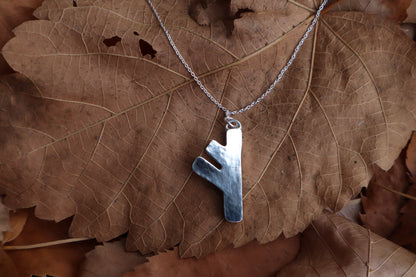 Fehu Wolf Bone and Silver Talisman