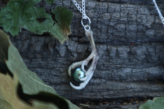 Clutched Pearl Necklace