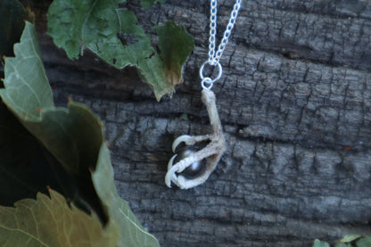 Clutched Pearl Necklace