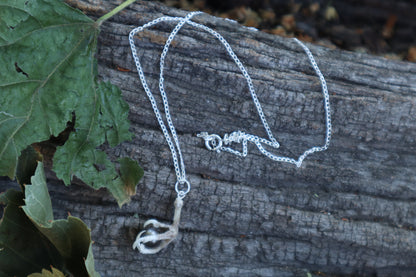 Clutched Pearl Necklace