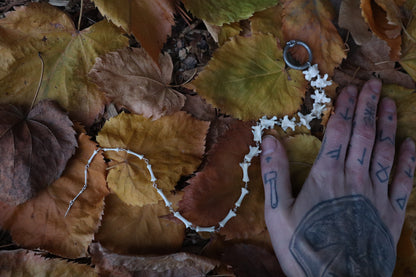 Fluid Raccoon Tail Articulation with Ouroboros Ring
