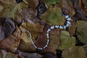 Fluid Raccoon Tail Articulation with Ouroboros Ring