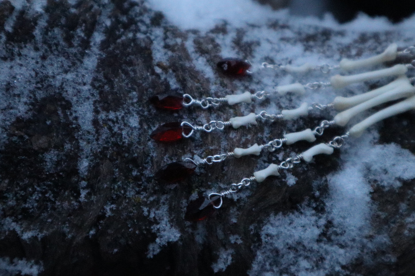 Reserved for Ann-Marie Beach - Fluid Striped Skunk Paw Articulation Necklace with Garnet “Claws”