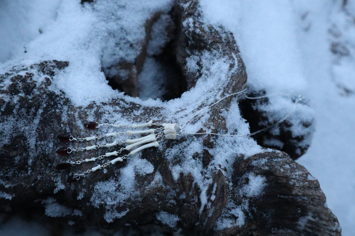 Reserved for Ann-Marie Beach - Fluid Striped Skunk Paw Articulation Necklace with Garnet “Claws”