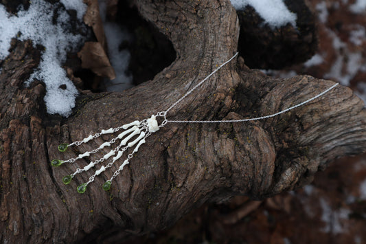 Fluid Striped Skunk Paw Articulation Necklace with Peridot “Claws”
