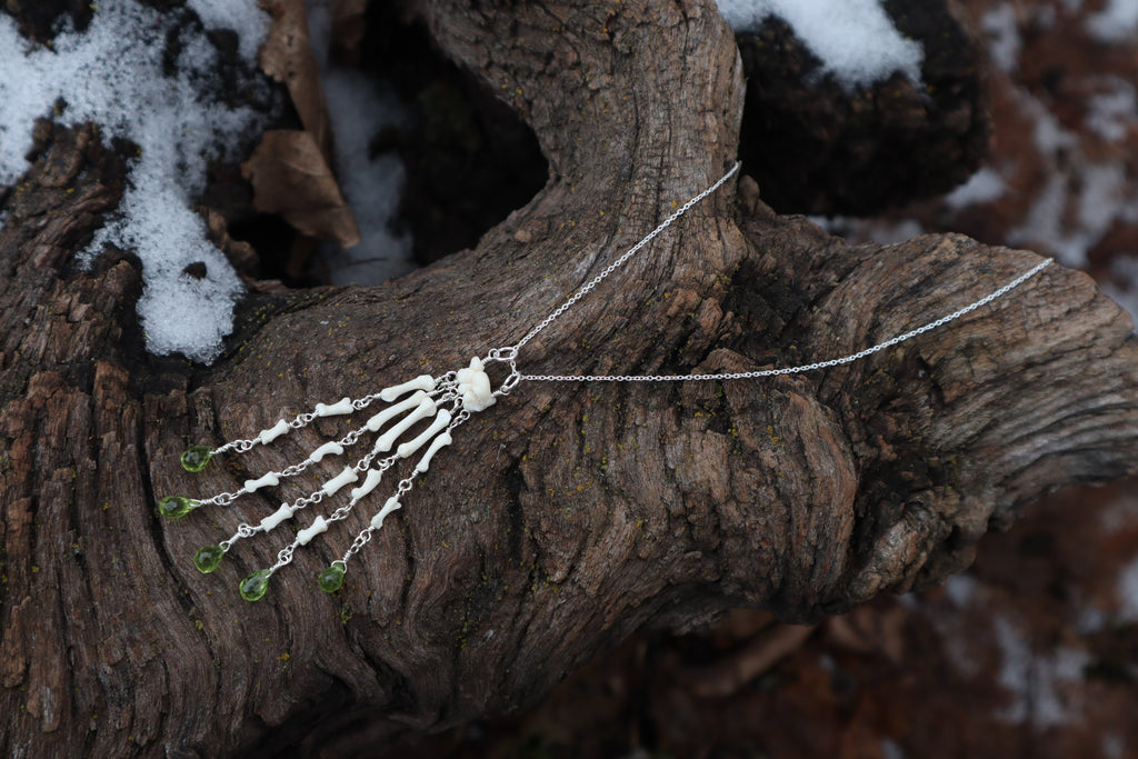 Fluid Striped Skunk Paw Articulation Necklace with Peridot “Claws”
