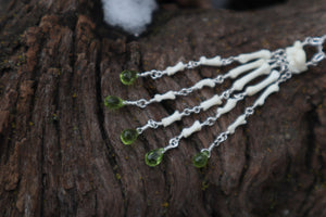 Fluid Striped Skunk Paw Articulation Necklace with Peridot “Claws”