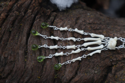Fluid Striped Skunk Paw Articulation Necklace with Peridot “Claws”
