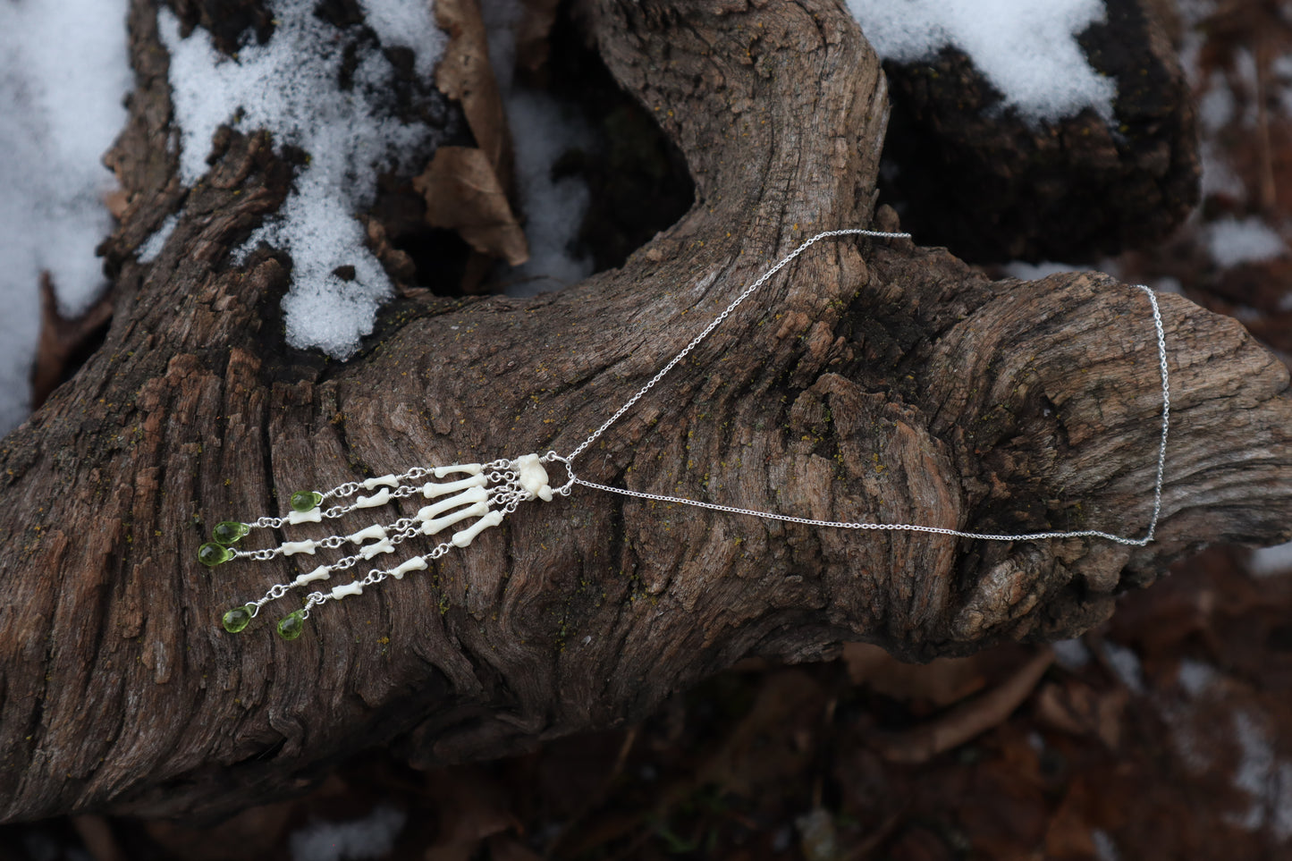Fluid Striped Skunk Paw Articulation Necklace with Peridot “Claws”