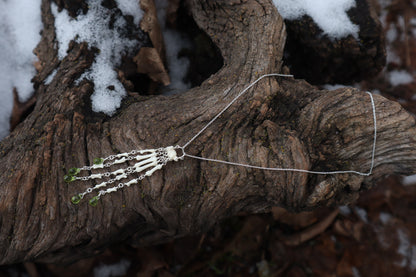 Fluid Striped Skunk Paw Articulation Necklace with Peridot “Claws”