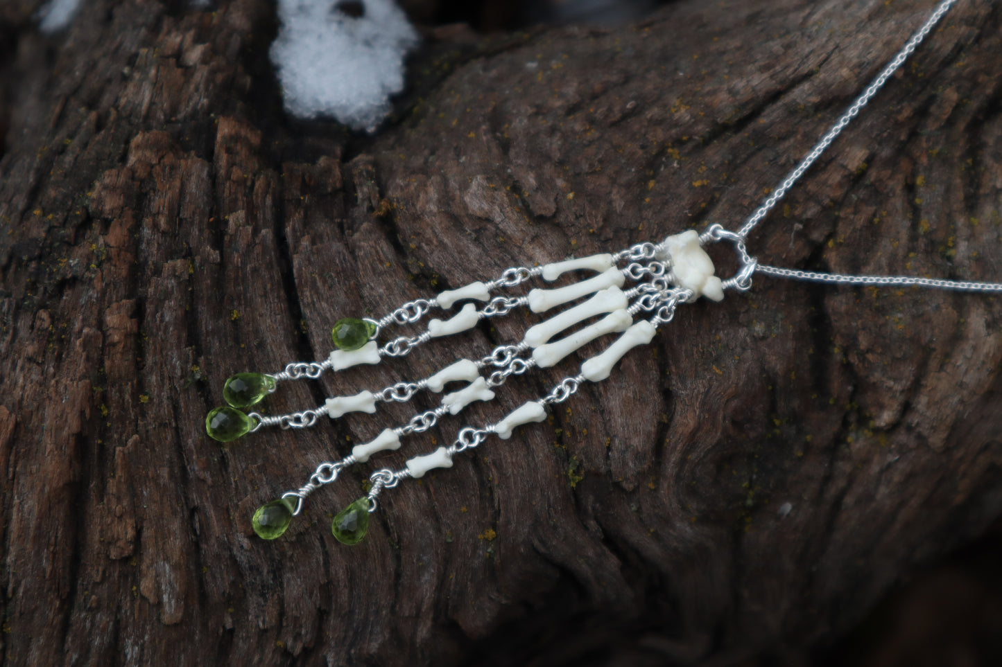 Fluid Striped Skunk Paw Articulation Necklace with Peridot “Claws”