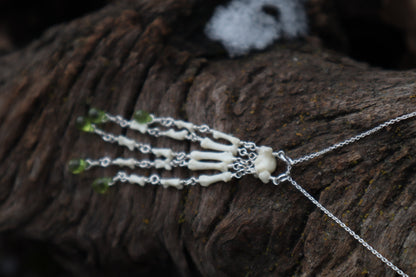 Fluid Striped Skunk Paw Articulation Necklace with Peridot “Claws”
