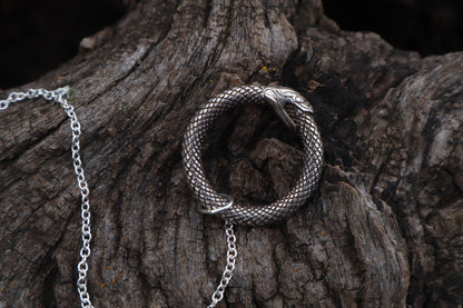 Gray Wolf Blood and Bone Quartz Pendulum with Ouroboros Ring