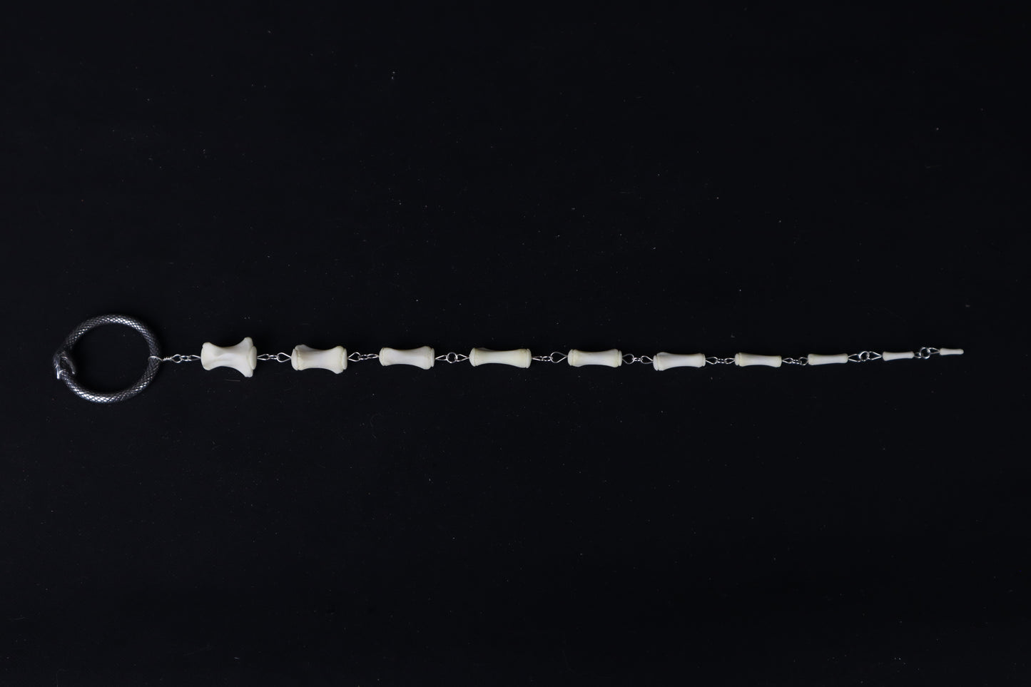 Fluid Whitetail Deer Tail Articulation with Ouroboros Ring