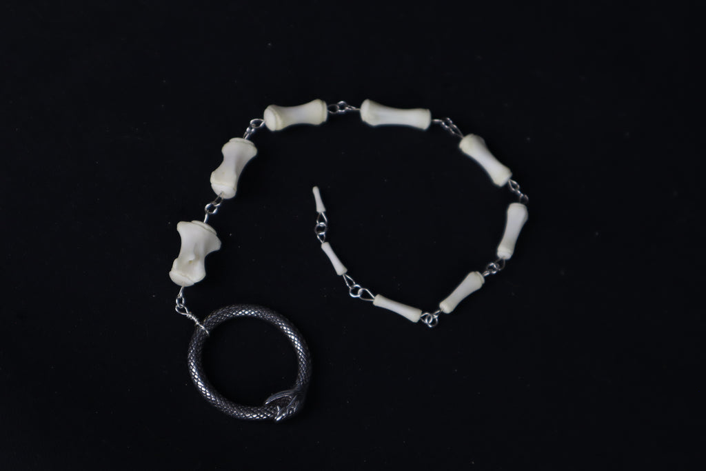 Fluid Whitetail Deer Tail Articulation with Ouroboros Ring