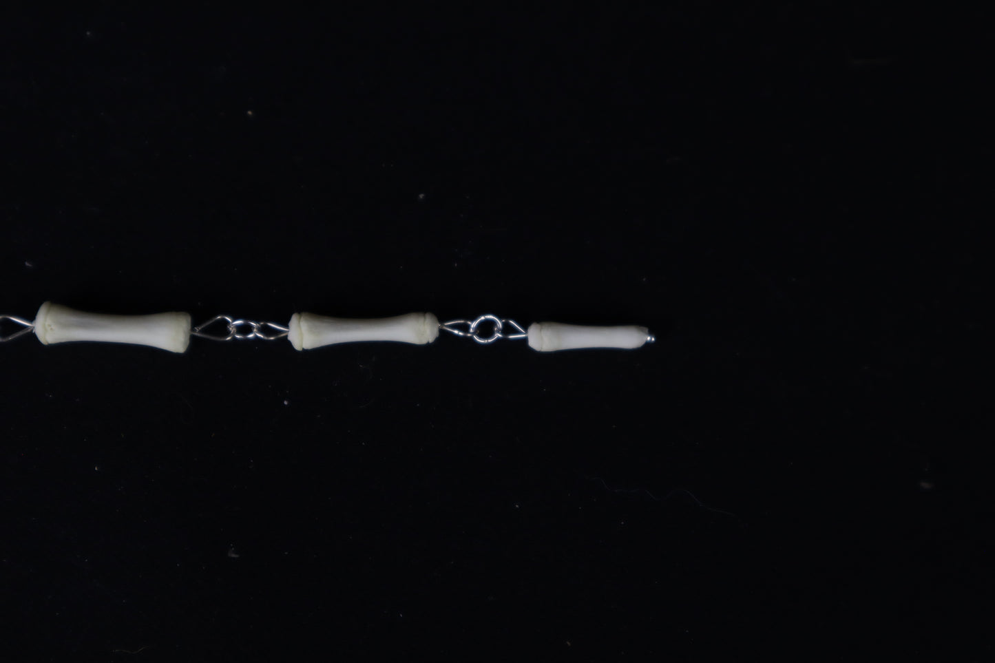 Whitetail Deer Tail Articulation with Ouroboros Ring