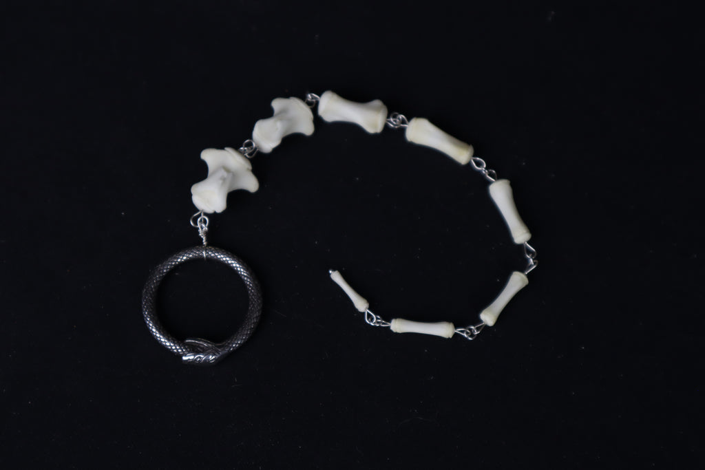 Whitetail Deer Tail Articulation with Ouroboros Ring