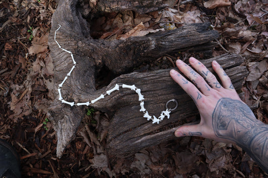 Fluid Red Fox Tail Articulation with Ouroboros Ring