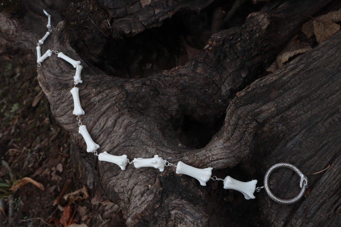 Fluid Gray Wolf Tail Articulation with Ouroboros Ring