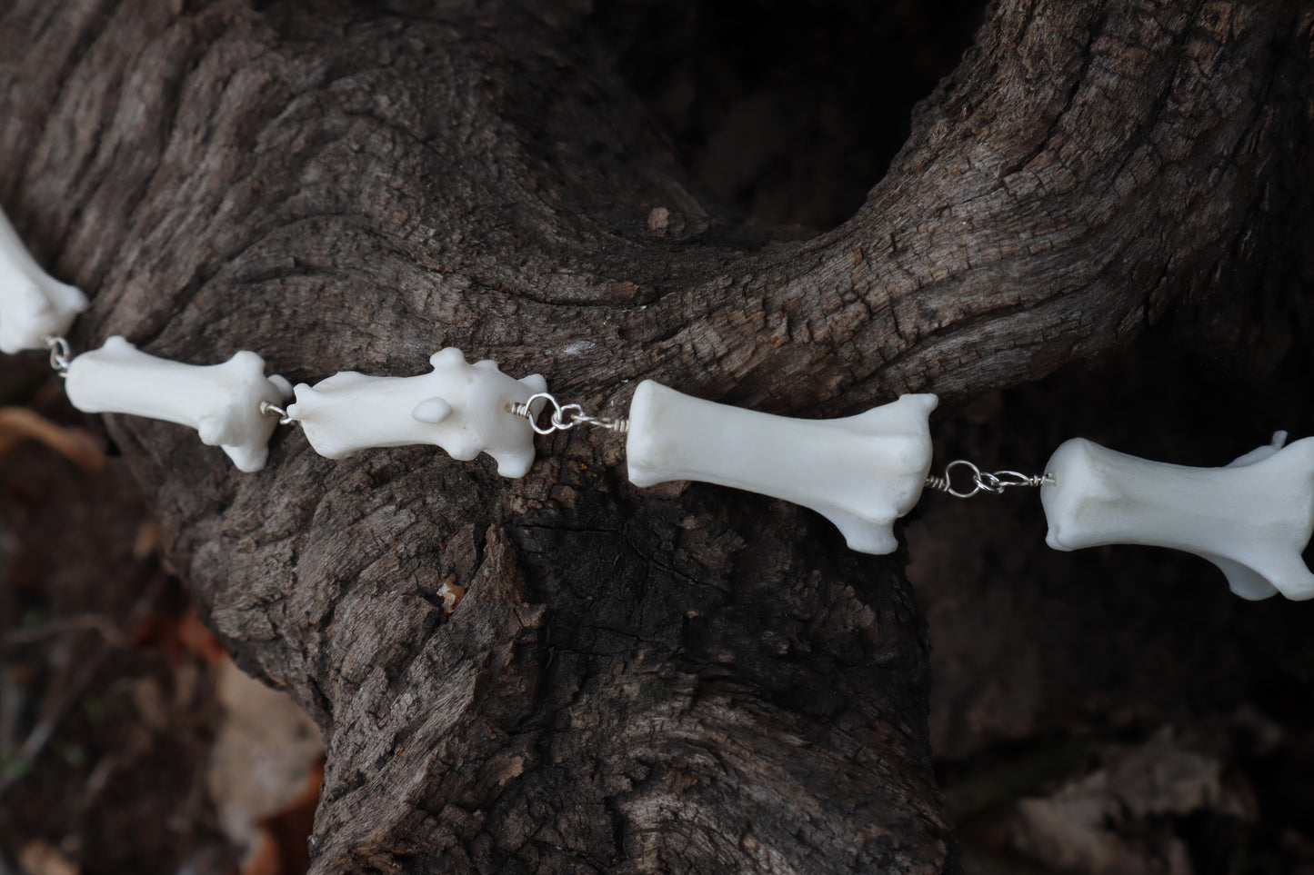 Fluid Gray Wolf Tail Articulation with Ouroboros Ring