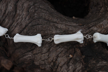 Fluid Gray Wolf Tail Articulation with Ouroboros Ring