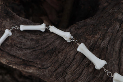 Fluid Gray Wolf Tail Articulation with Ouroboros Ring