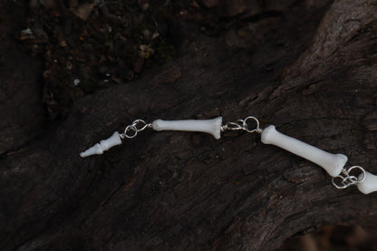 Fluid Gray Wolf Tail Articulation with Ouroboros Ring