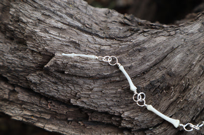Fluid Raccoon Tail Articulation with Ouroboros Ring