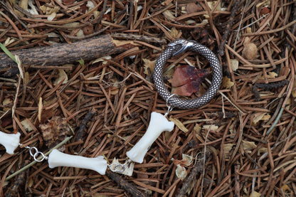 Fluid Raccoon Tail Articulation with Ouroboros Ring