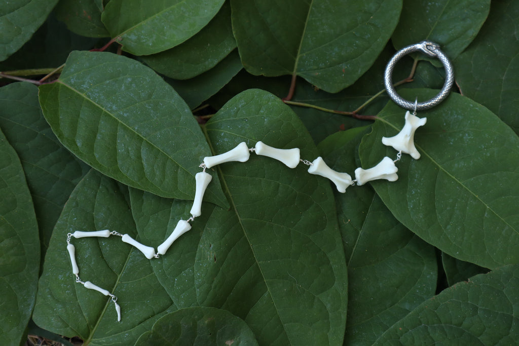 Fluid Whitetail Deer Tail Articulation with Ouroboros Ring