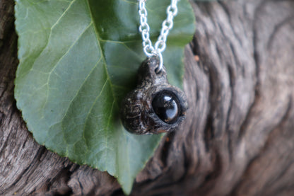 Raccoon Eyeball Talisman