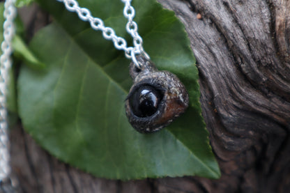 Raccoon Eyeball Talisman