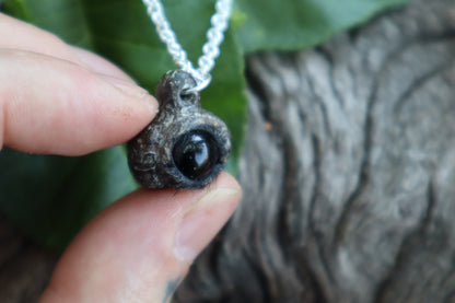 Raccoon Eyeball Talisman