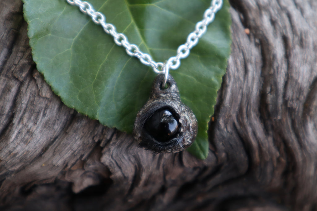 Raccoon Eyeball Talisman
