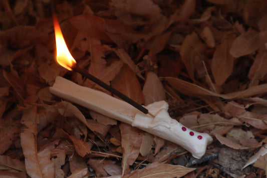 Gray Wolf Bone Incense Holder with Garnets