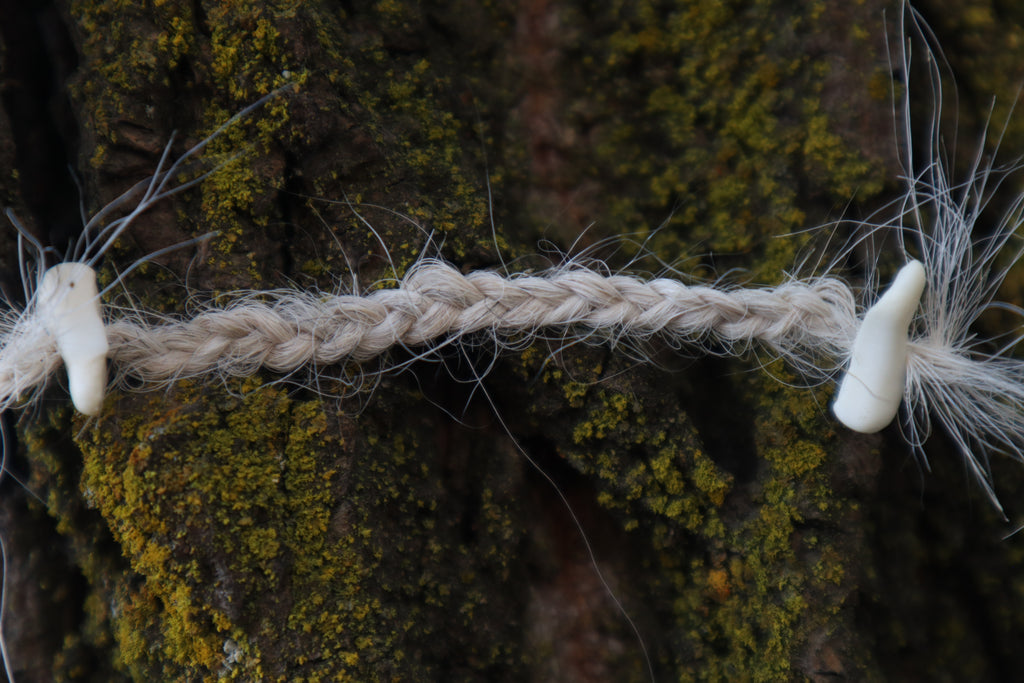 Gray Wolf Hair Braid with Black Wolf Bone Beads