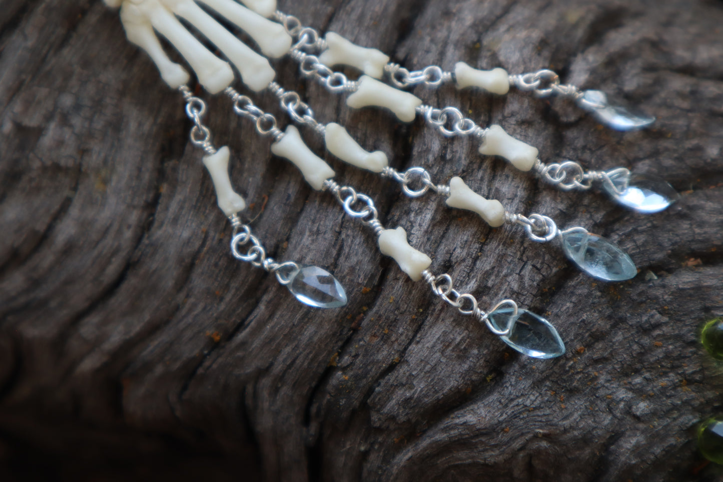 Fluid Striped Skunk Paw Articulation with Sky Blue Topaz “Claws”