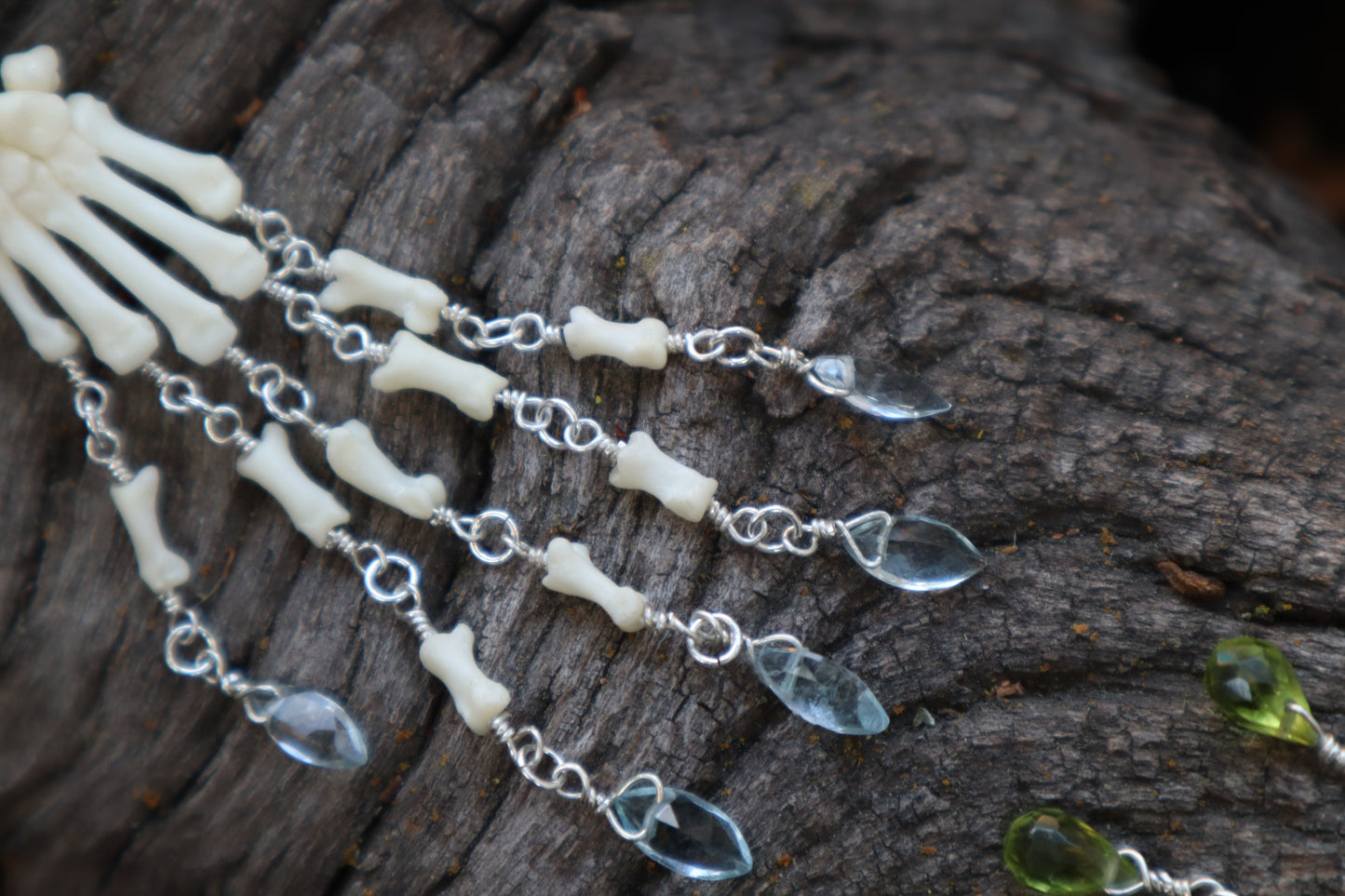 Fluid Striped Skunk Paw Articulation with Sky Blue Topaz “Claws”