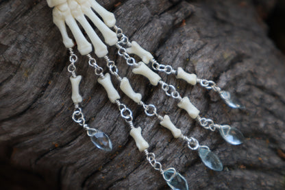 Fluid Striped Skunk Paw Articulation with Sky Blue Topaz “Claws”