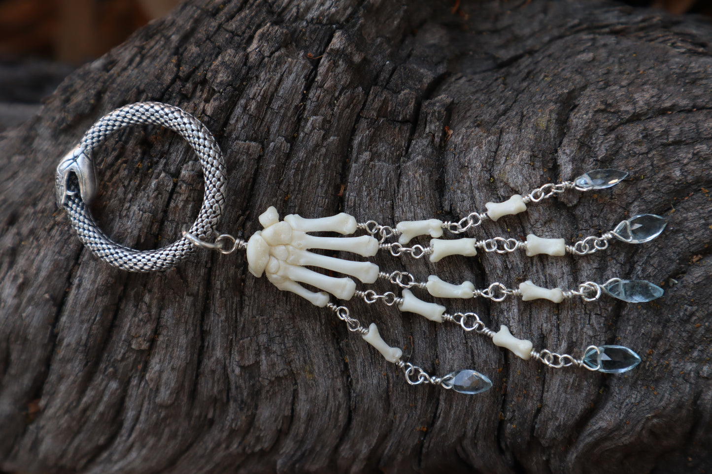 Fluid Striped Skunk Paw Articulation with Sky Blue Topaz “Claws”