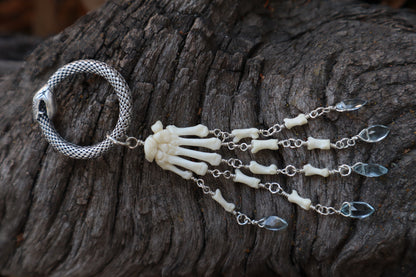 Fluid Striped Skunk Paw Articulation with Sky Blue Topaz “Claws”