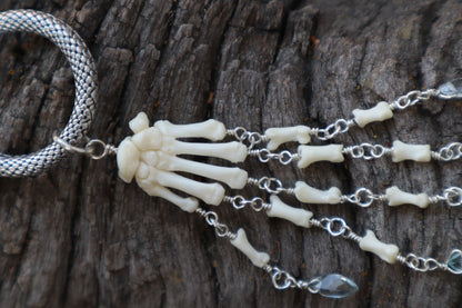 Fluid Striped Skunk Paw Articulation with Sky Blue Topaz “Claws”
